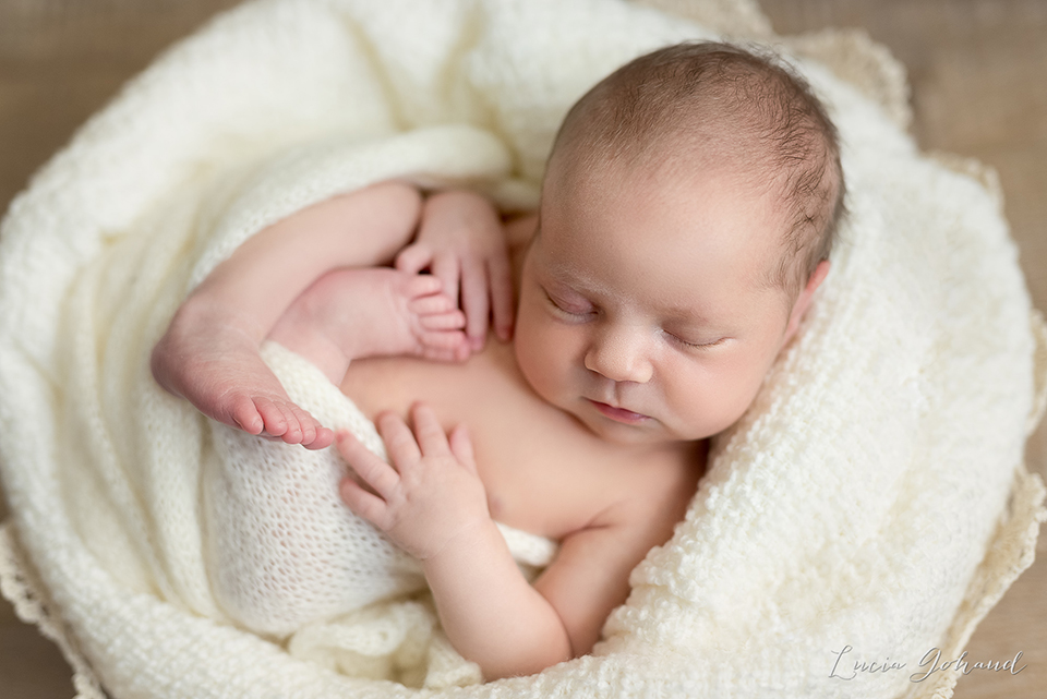 Bébé dans son cocon