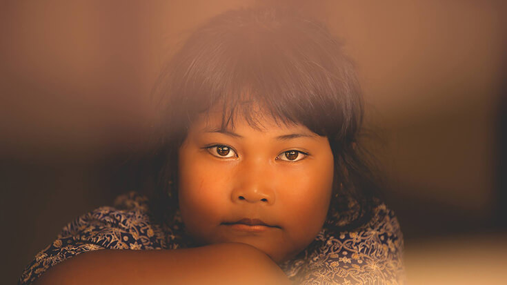 Portrait d'un enfant asiatique, par Olivier Faure